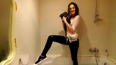 WETLOOKER - ABSOLUTE BEAUTY BATHING FULLY CLOTHED. ONE OF MY FAVOURITES!