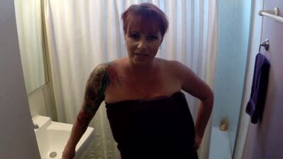 Рыжая милфа с большими сиськами