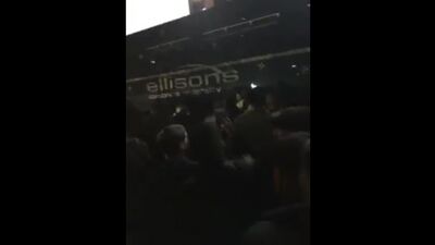 Arseanal fans shouting on the team bus